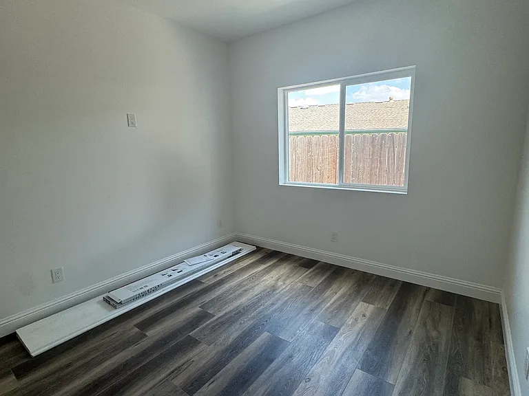 Bedroom #2 with ceiling fan & remote. Double pane windows in every room.