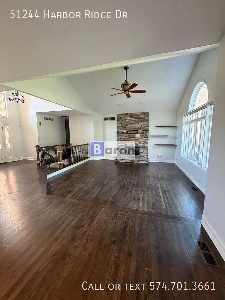 "Luxury Living Awaits: Spacious 4-Bedroom Home. Gleaming Hardwood Floors in Granger, IN!" — Photo 1