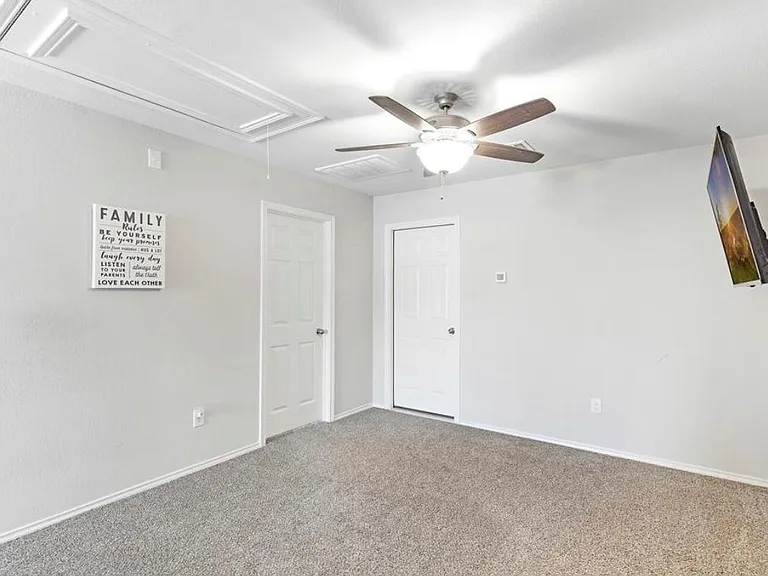 AT THE TOP OF THE STAIRS, YOU'LL FIND A FUN PLAYROOM / MEDIA ROOM (TV INCLUDED!)