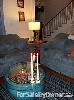 Living room with staircase
						:
						Staircase leads to 2 bedrooms, 1 bath with shower and office / den