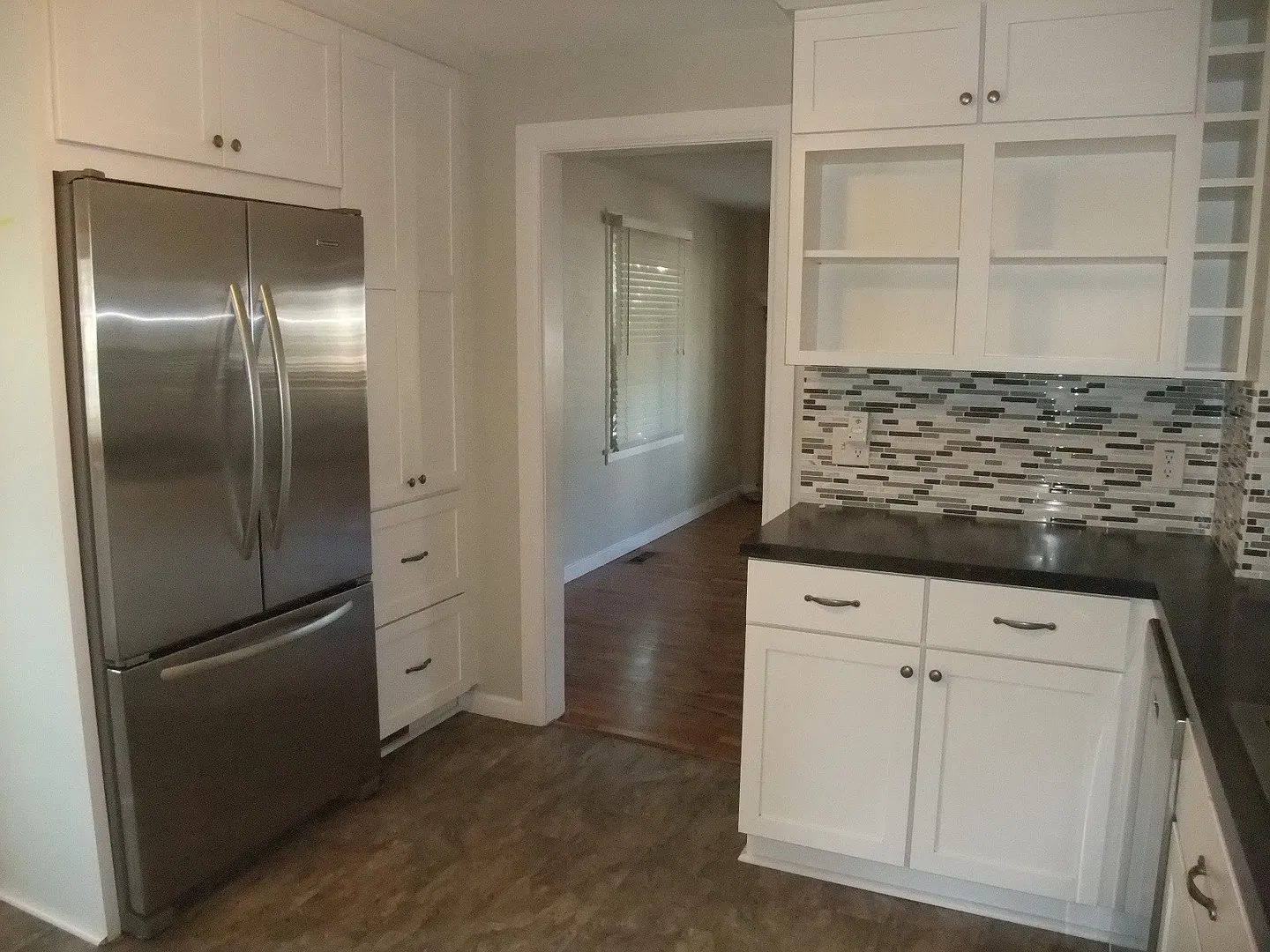 Nice home with an updated kitchen and hardwood flooring in SW Albany — Photo 3