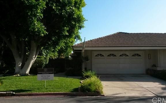 Single level living with gated courtyard entrance and no home directly behind you for maximum privacy