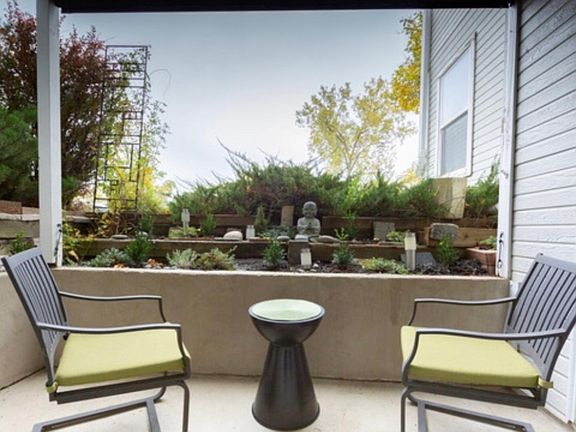 Patio with pulldown sunshade.