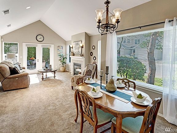 Vaulted Ceilings w/Elegant Formal Dining Room, which opens to Family Room