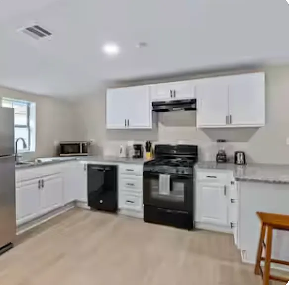 Open Concept Kicthen- Opens to Livingroom and Eat-In kitchen area.