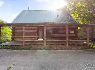 8221 E Eight Mile Rd, Luther, MI 49656