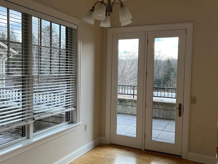 Dining area and doors to patio