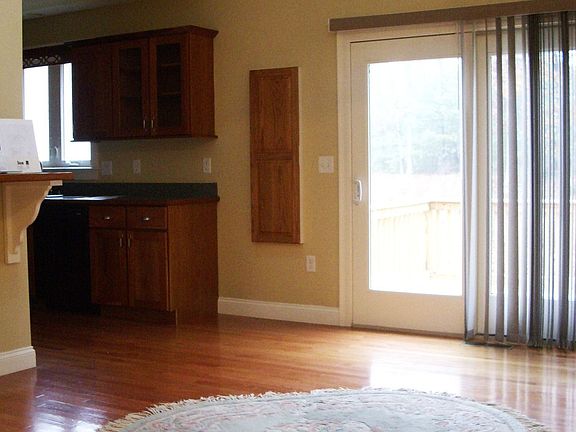 Open floor Plan Dining Room w/sliders to private deck and skylight