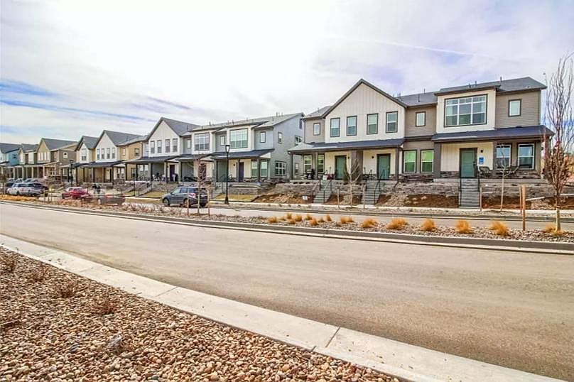 Exterior view of new townhome complex minutes from Boulder on a private street with plenty of parking.