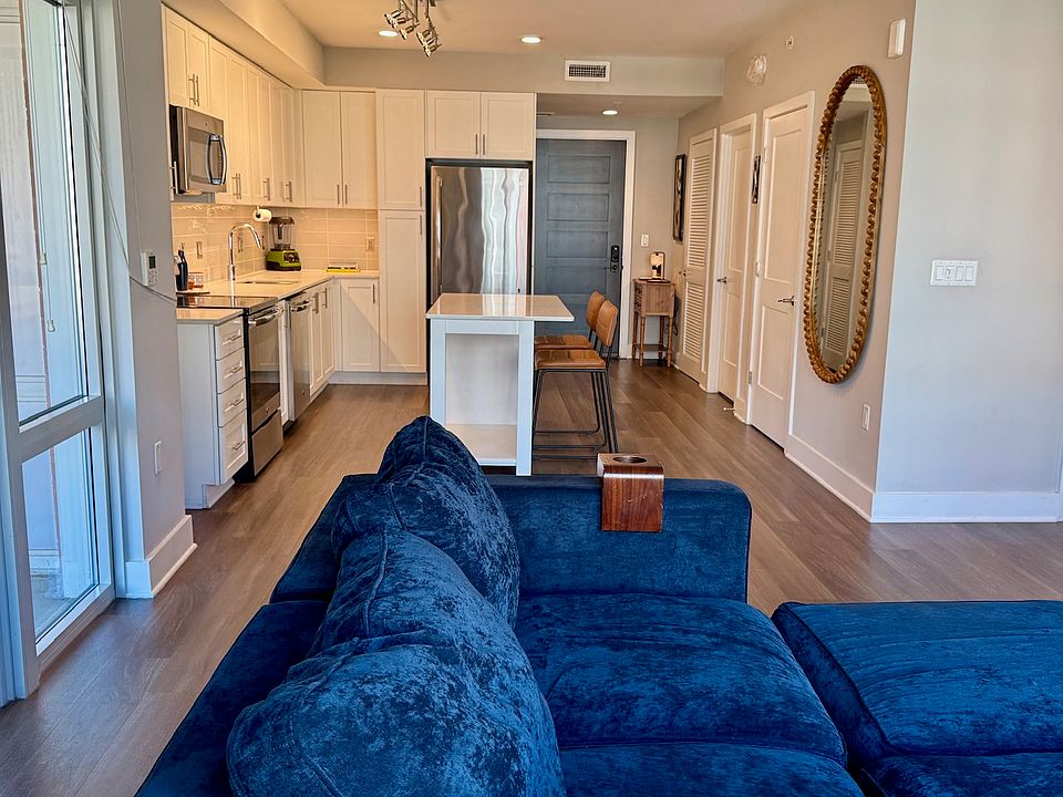 Main entry, living, dining, and kitchen
