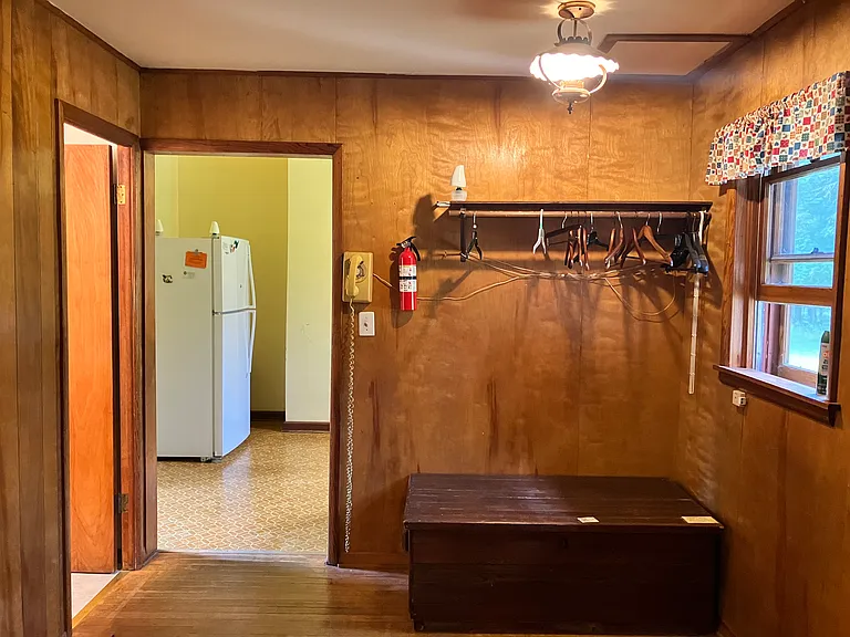 Telephone room - bathroom is to the left and kitchen is straight ahead