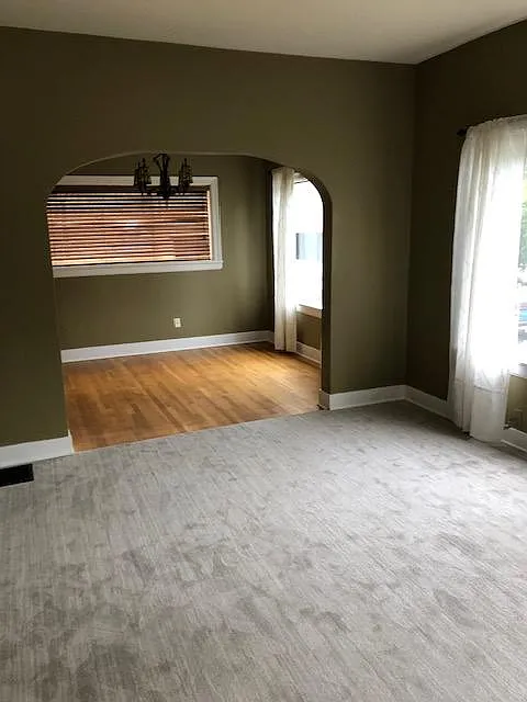 Livingroom and archway to dining room
