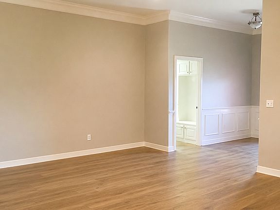Living room, entry, and laundry room