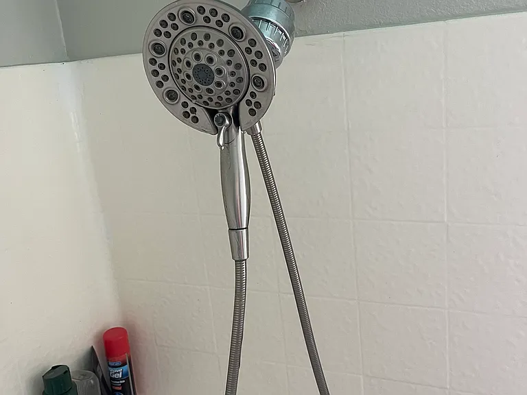 The master shower has a large soaking tub