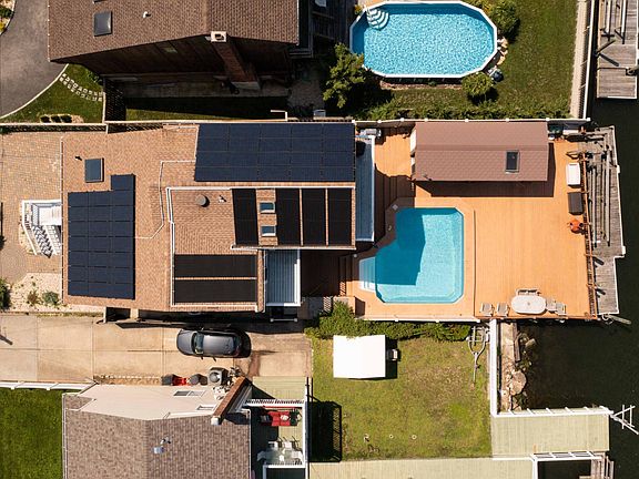 Solar Panels (Keep Electrical Costs Down) and Open, Sunny Composite Deck