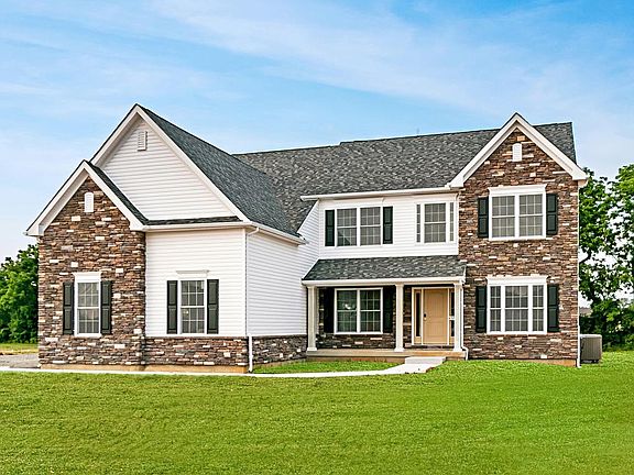 Churchill Farmhouse Exterior with Side Entry Garage