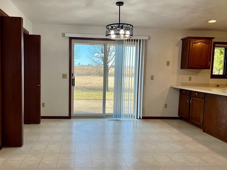 Large closet on the left with backyard patio access