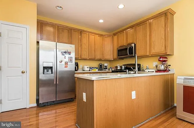 Kitchen has been recently renovated with granite countertops and new appliances.