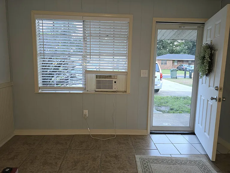 Spacious living room walks right out to front parking. More photos coming.