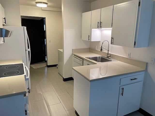 Washer and dryer in kitchen area