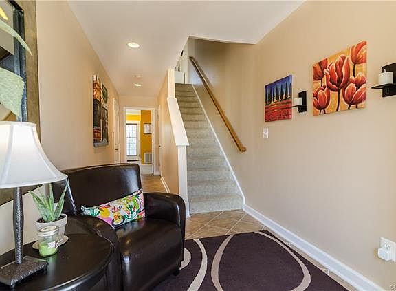 entry foyer with garage access and bonus 4th bedroom/bath su