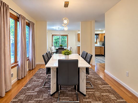 Elegant dining area with seating for family meals, work, or entertaining