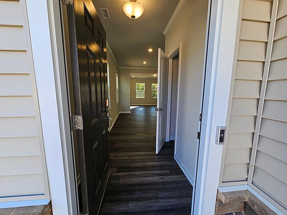 Entry foyer with coat closet on the right