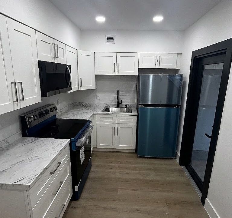 1st image of 334 W 36th Ter