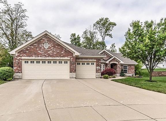 Extra wide driveway - all the way to edge of house.