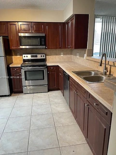 Photo 1 of 17 - 1733 Village Blvd #111 - West Palm Beach, FL Primary Photo - 1733 Village Blvd #111