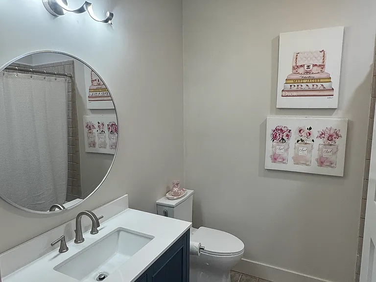 Hall bath with new vanity, fixtures and toilets
