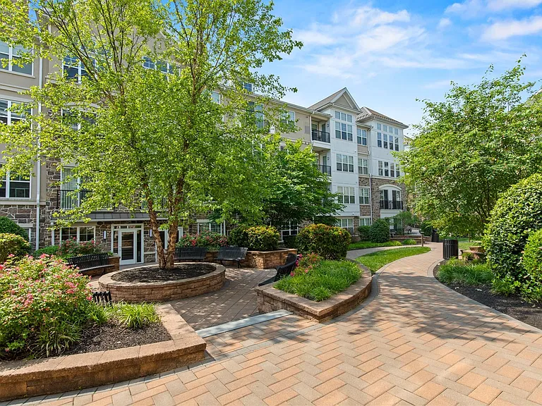 Outdoor Patio Seating Area at Heights at Glen Mills Apartments in Glen Mills, PA 19342