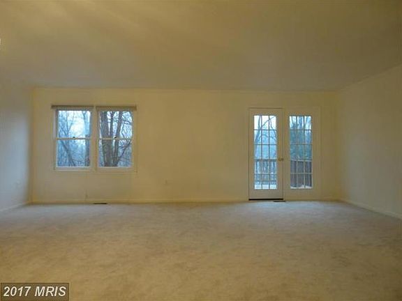 Spacious Light Filled Family Room Leading To A Deck