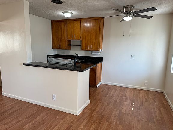 Eating area and part of kitchen. It's a nice place!