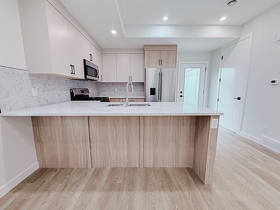 2nd image of 3920 77th St NW Unit 102