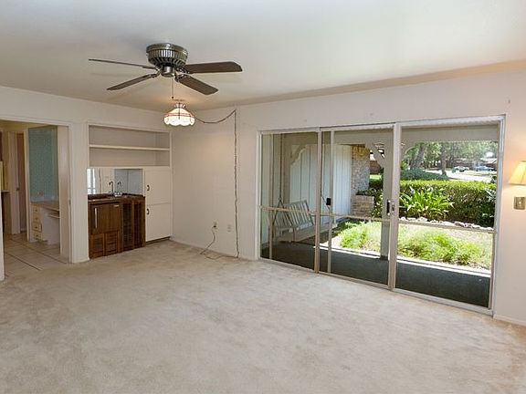 The Formal Living Room has a wet bar and a great view of the front porch