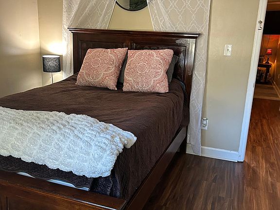 Bedroom with double closets & ceiling fan