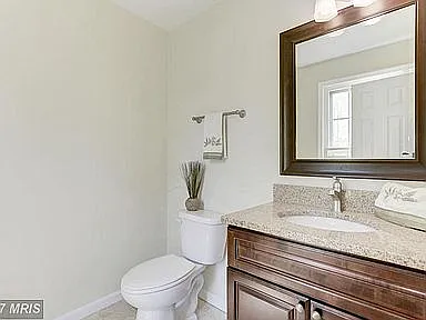 Half Bath Room next to entrance way.