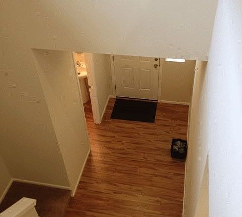 Entry from 2nd Floor showing Powder Room