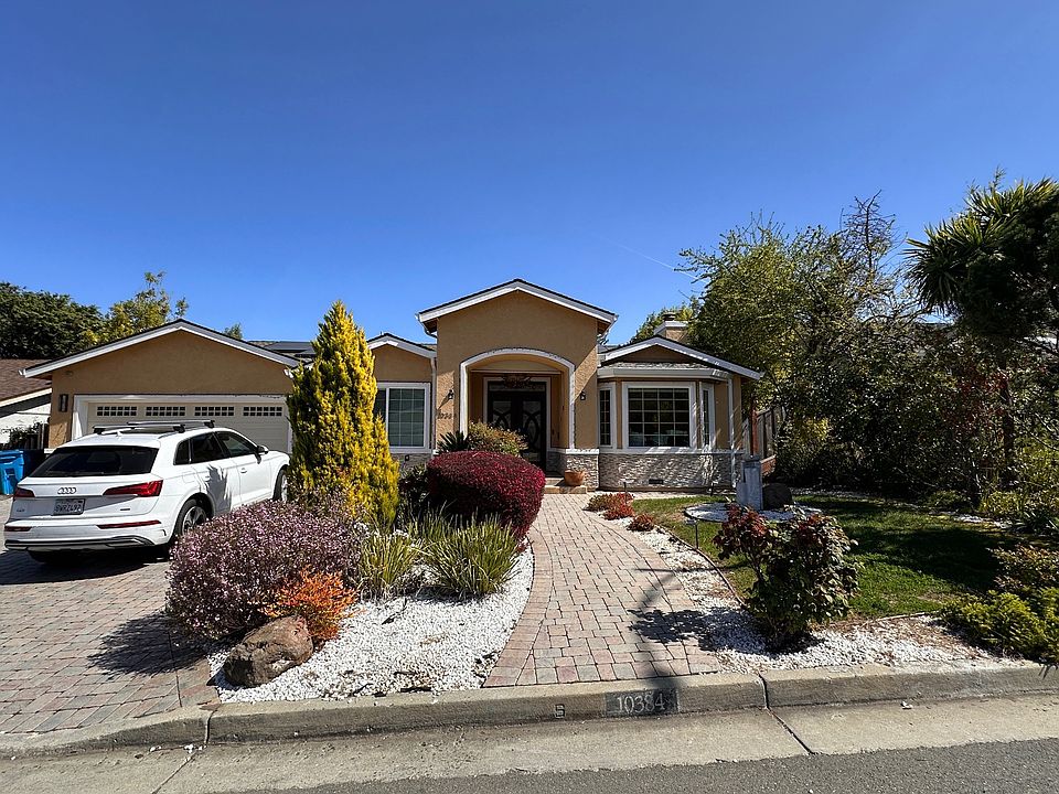 Front of the Home! Hardscaping, water fountain, Japanese Maple tree and Solar Panels with Tesla charger
