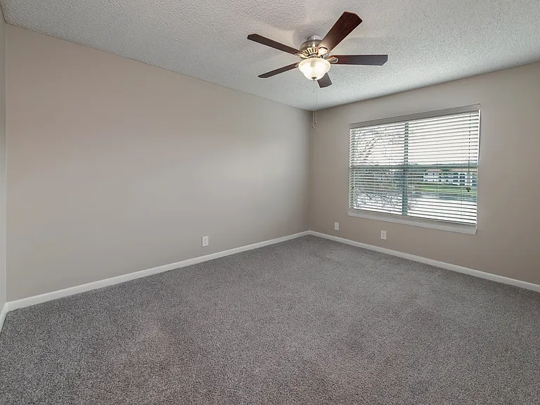 Our master suite retreats offer luxurious carpeting, a walk-in closet, and a blissful lighted ceiling fan.