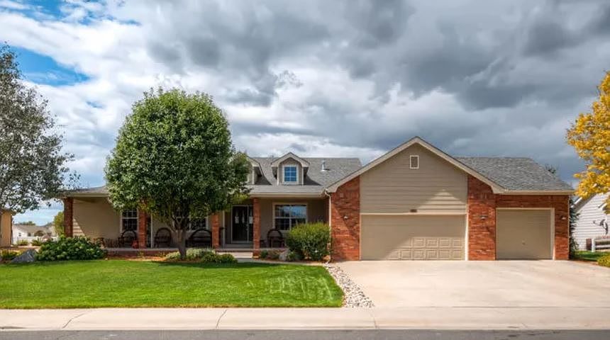 Front of Home. Designated parking sport in driveway in front of 3rd car garage stall or on street in front of home.