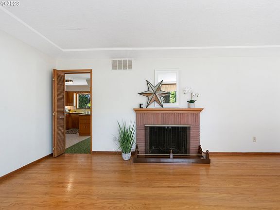 5th image of 10665 SW Derry Dell Ct