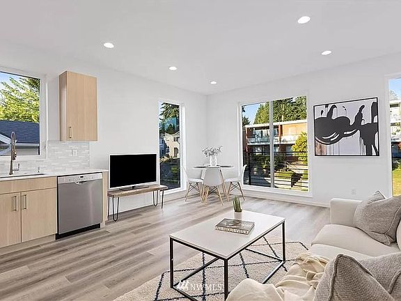 The kitchen and the living room are located on the middle floor.