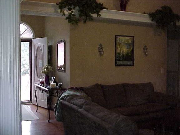 Another view of Livingroom which has gorgeous hardwood floors