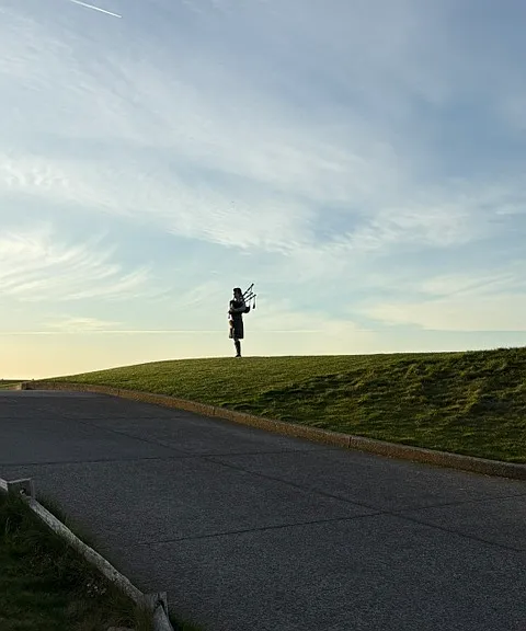 Bagpiper at the Inn at Spanish Bay, a short drive away.