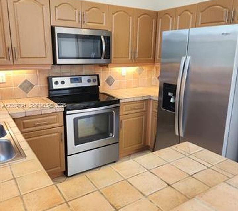 1st image of 11425 NW 76th Ter #Townhouse 11425
