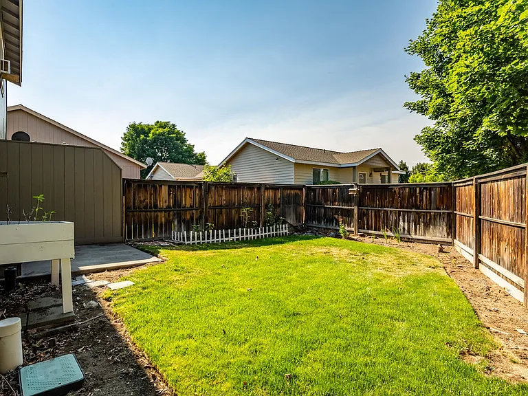 Full enclosed fenced yard with irrigation/sprinklers. Landscape maintenance included.