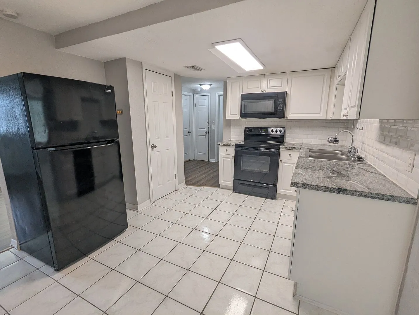 Beautiful POOL home with a large back yard.. 3/1.5 1360 Sq. Ft. with updated kitchen & bathrooms!! — Photo 3