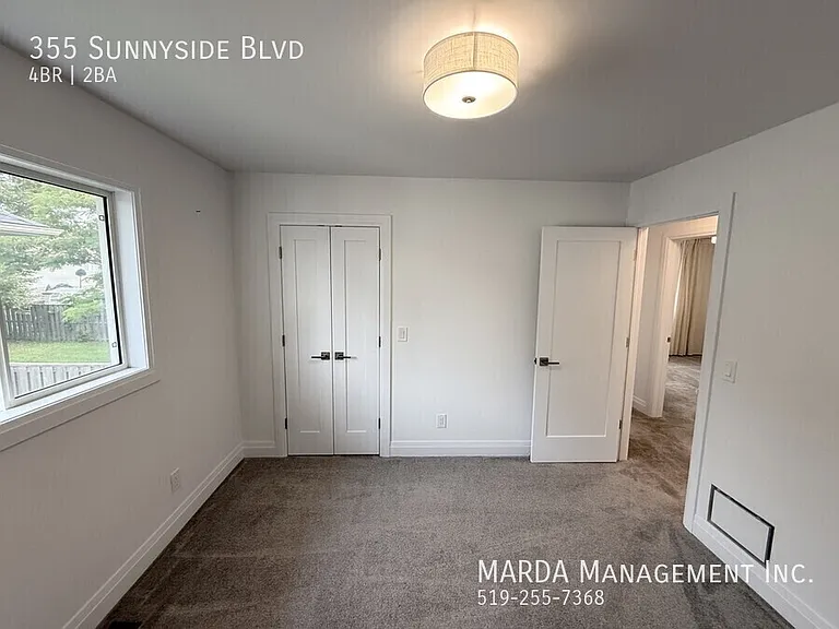 355 Sunnyside Blvd — Photo 26